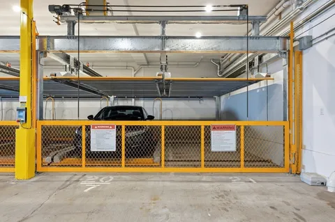 a view of a swimming pool with an outdoor seating