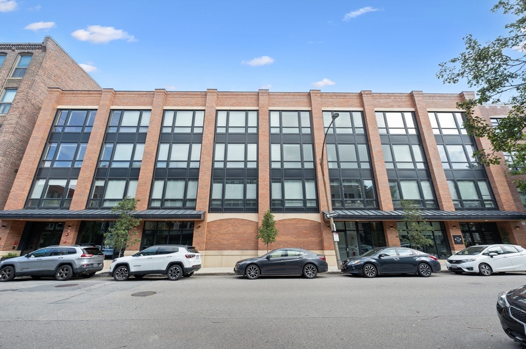 340 West 2nd Street, Unit 5 Boston, MA 02127 - Photo 24 of 25 a car parked in front of a building