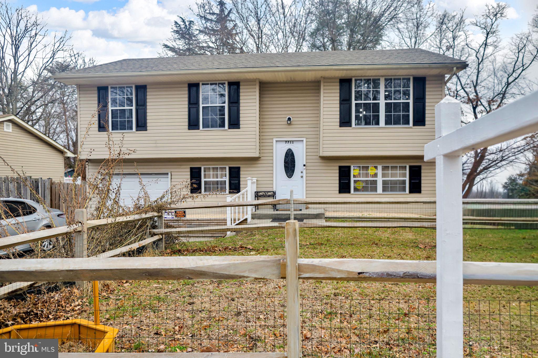 Charming split-level home with yard.
