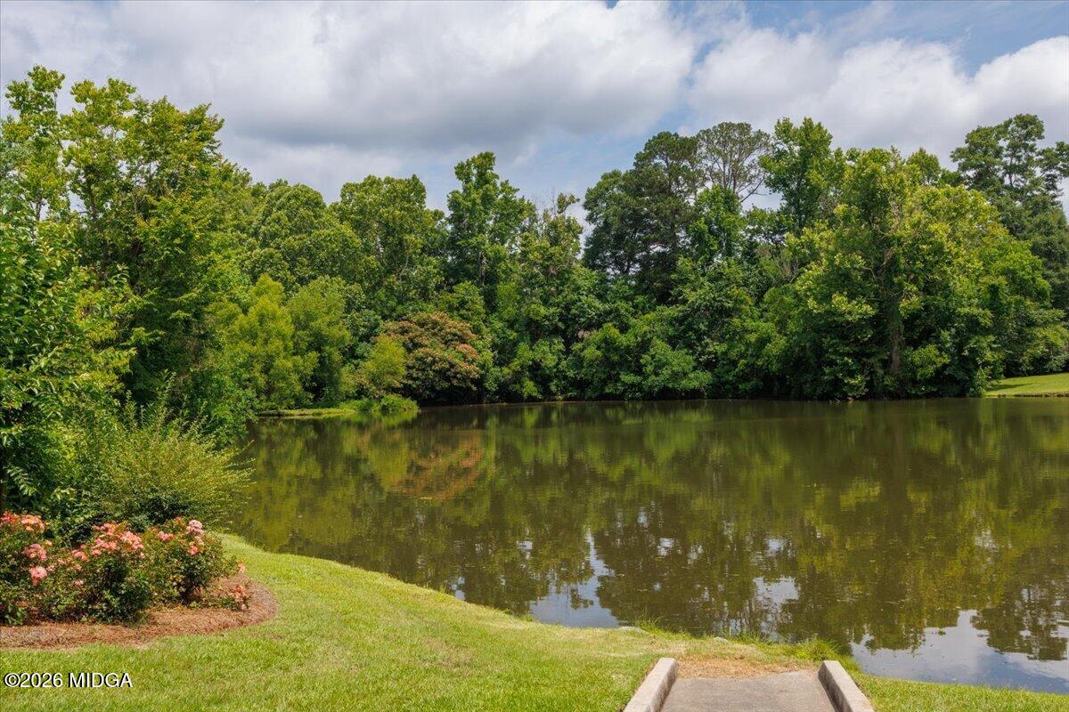 210 Oberon Place Macon, GA 31210 - Photo 31 of 31 a view of a lake with a house in the background