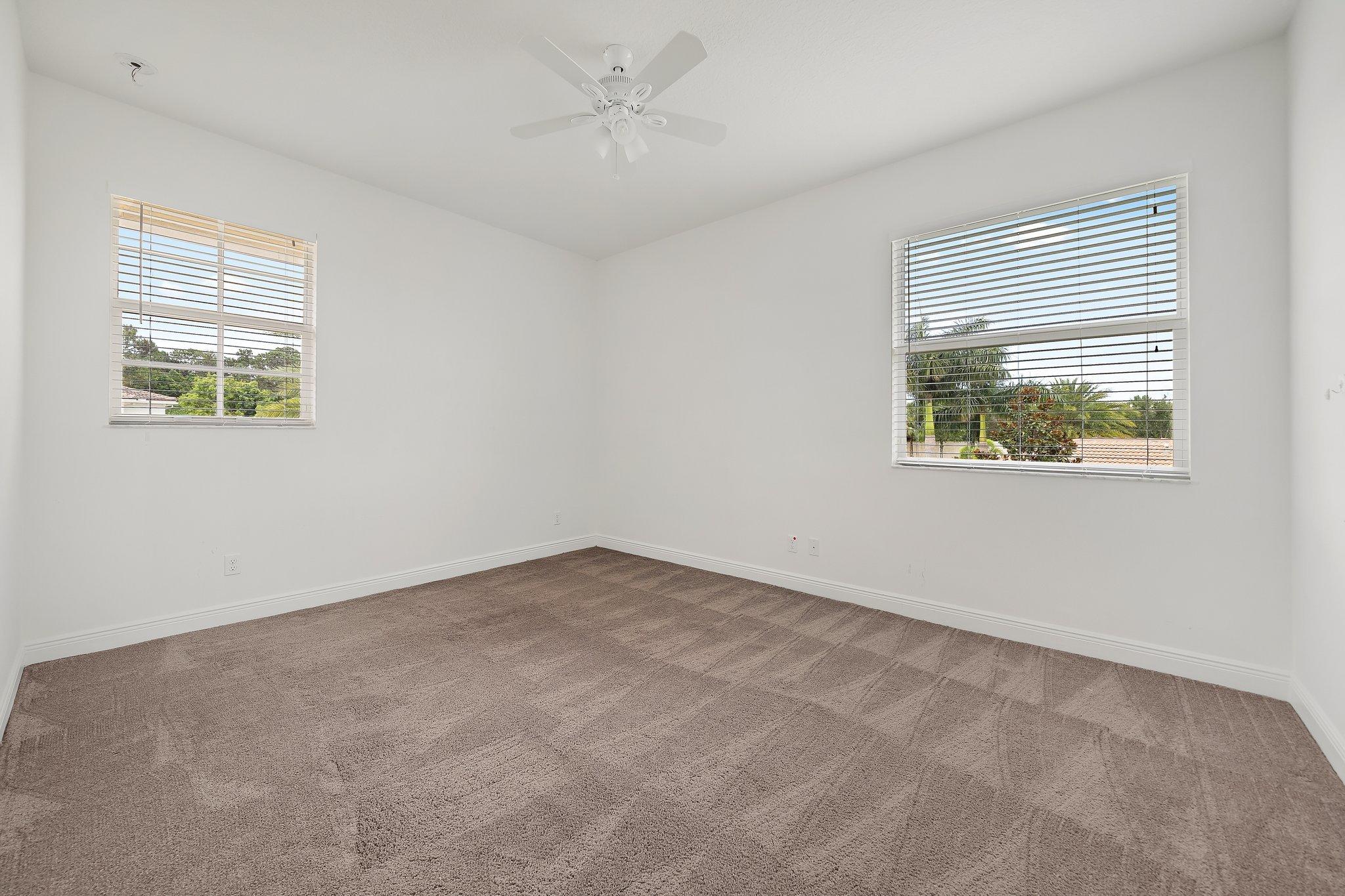 434 Rudder Cay Way Jupiter, FL 33458 - Photo 38 of 52 a view of an empty room with a window