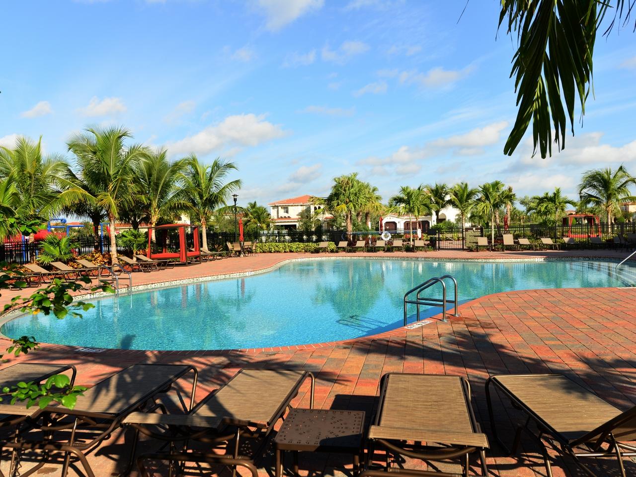 434 Rudder Cay Way Jupiter, FL 33458 - Photo 49 of 52 an outdoor space with furniture and garden view