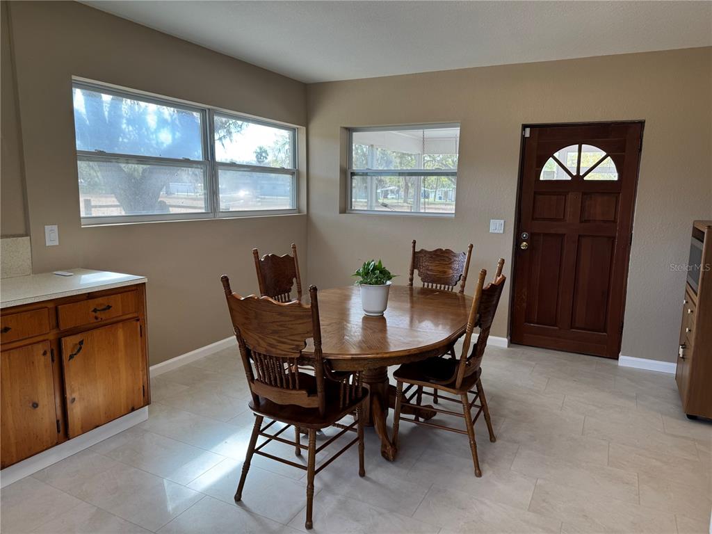 5333 Deeson Road Lakeland, FL 33810 - Photo 8 of 44 a dining room with furniture and window