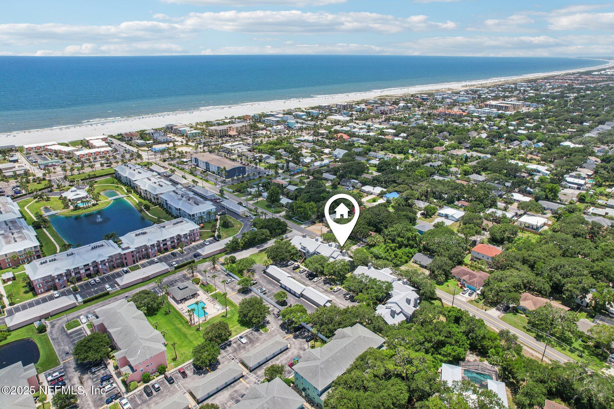 200 16th Street, Unit 103A St. Augustine Beach, FL 32080 - Photo 1 of 51 an aerial view of a city