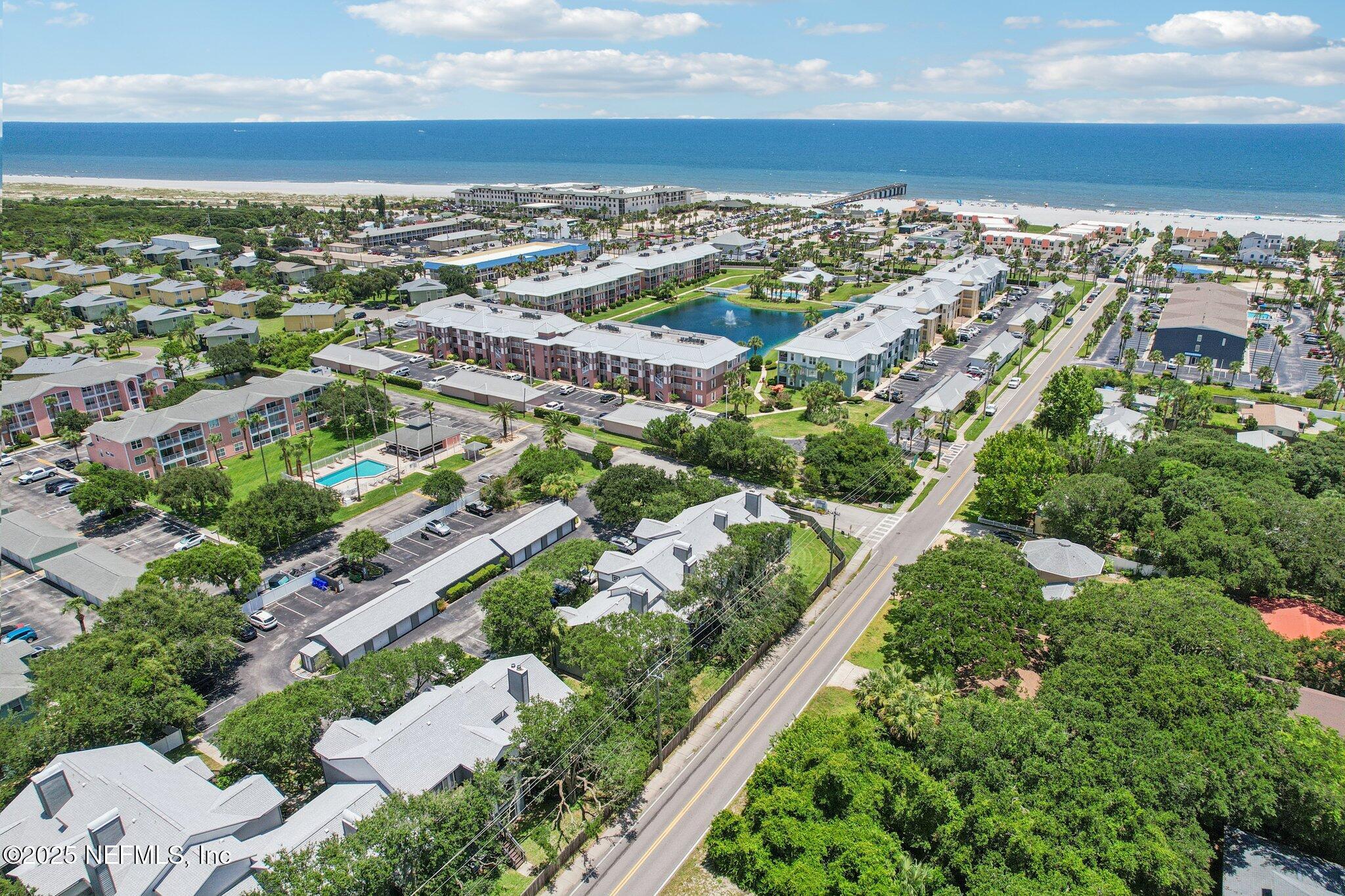 200 16th Street, Unit 103A St. Augustine Beach, FL 32080 - Photo 44 of 51 an aerial view of residential houses with outdoor space