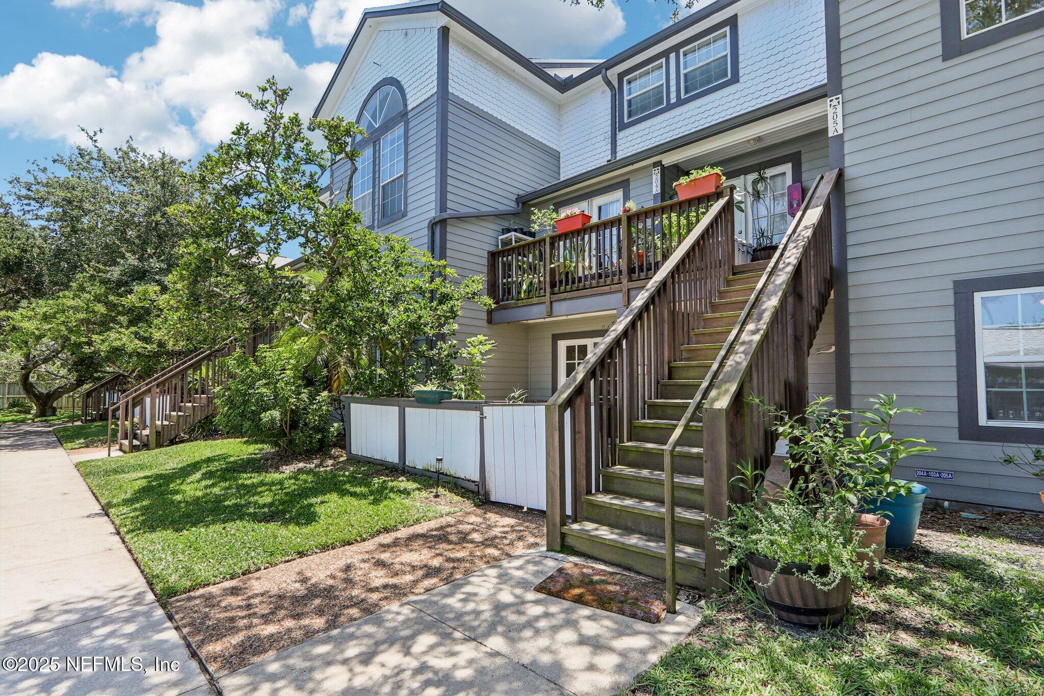200 16th Street, Unit 103A St. Augustine Beach, FL 32080 - Photo 5 of 51 a view of entryway with a front door