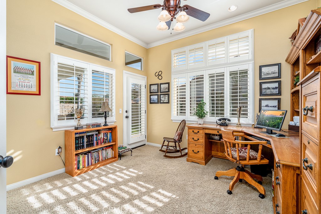 1877 Cashew Tree Street Hemet, CA 92545 - Photo 14 of 32 a view of a workspace with furniture and a window