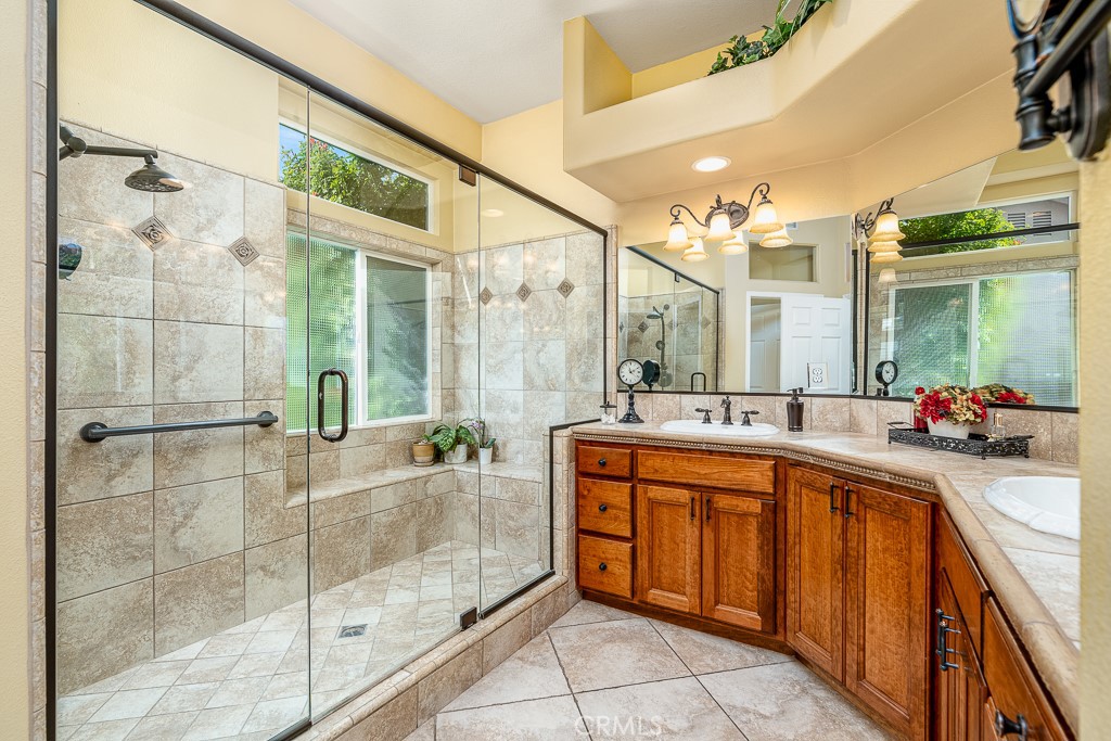 1877 Cashew Tree Street Hemet, CA 92545 - Photo 18 of 32 a large bathroom with a tub and shower