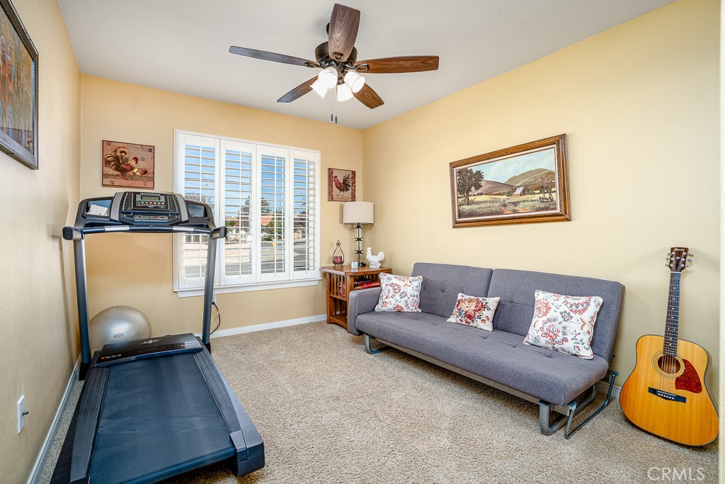 1877 Cashew Tree Street Hemet, CA 92545 - Photo 23 of 32 a living room with furniture and a window