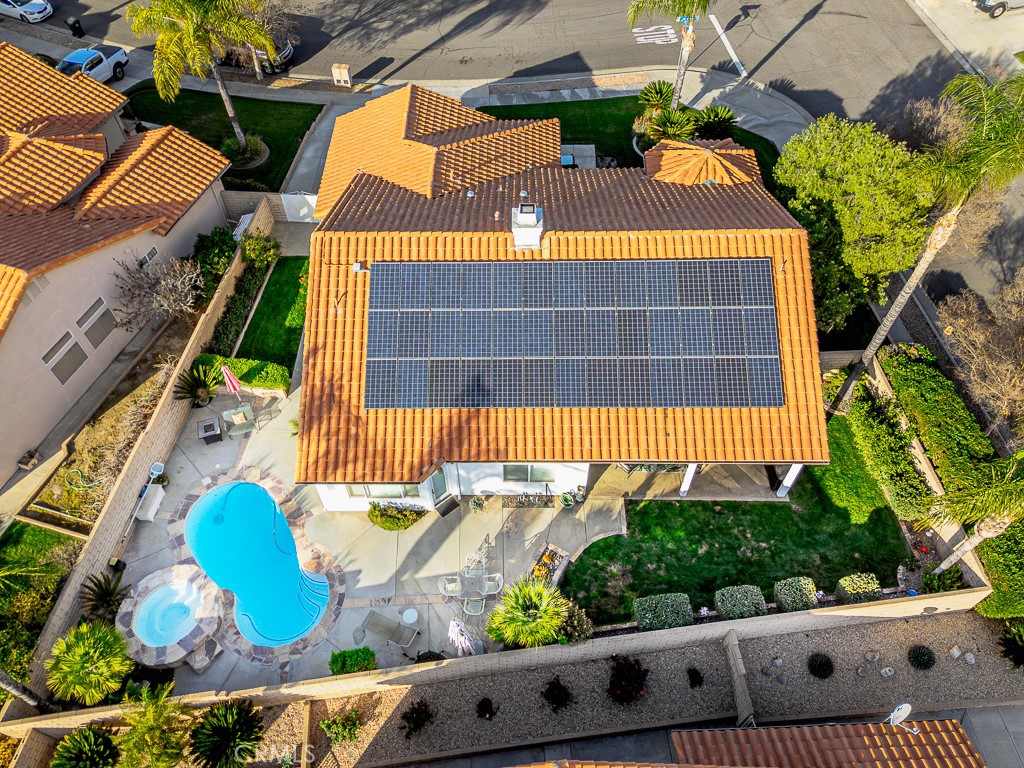 1877 Cashew Tree Street Hemet, CA 92545 - Photo 30 of 32 an aerial view of a house with a swimming pool