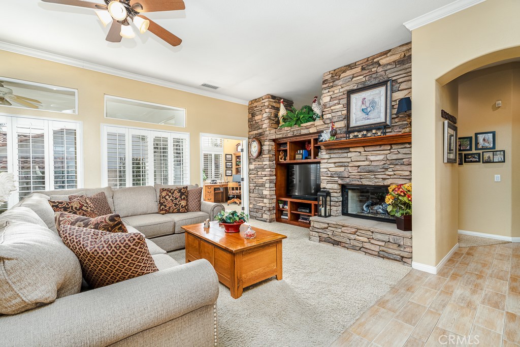 1877 Cashew Tree Street Hemet, CA 92545 - Photo 6 of 32 a living room with furniture and a fireplace