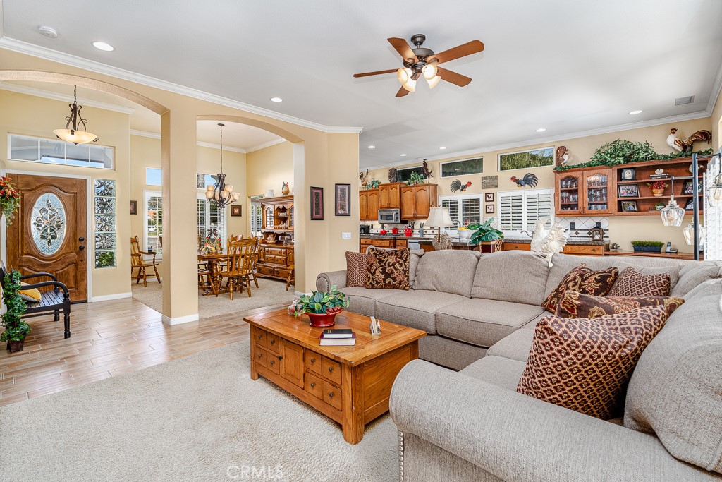 1877 Cashew Tree Street Hemet, CA 92545 - Photo 7 of 32 a living room with furniture kitchen view and a window