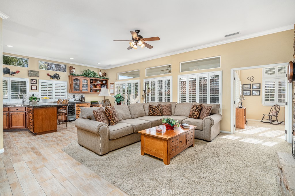 1877 Cashew Tree Street Hemet, CA 92545 - Photo 9 of 32 a living room with furniture and a large window