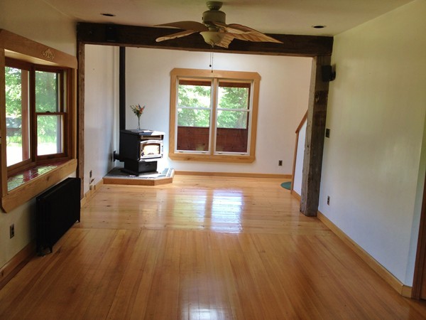 8 Old Worcester Road Westminster, MA 01473 - Photo 11 of 25 a view of an empty room with wooden floor and a window