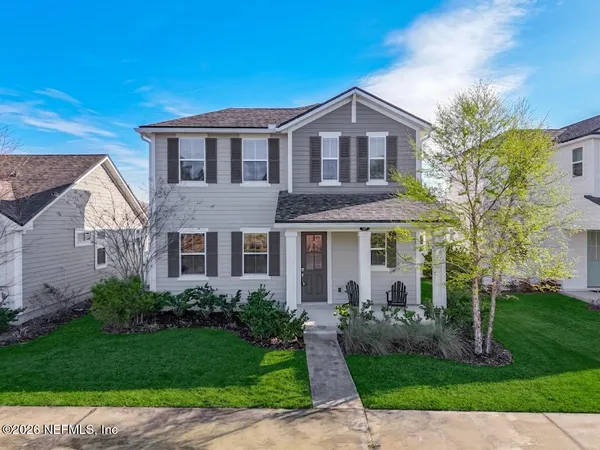 a kitchen with stainless steel appliances a stove a refrigerator and a oven