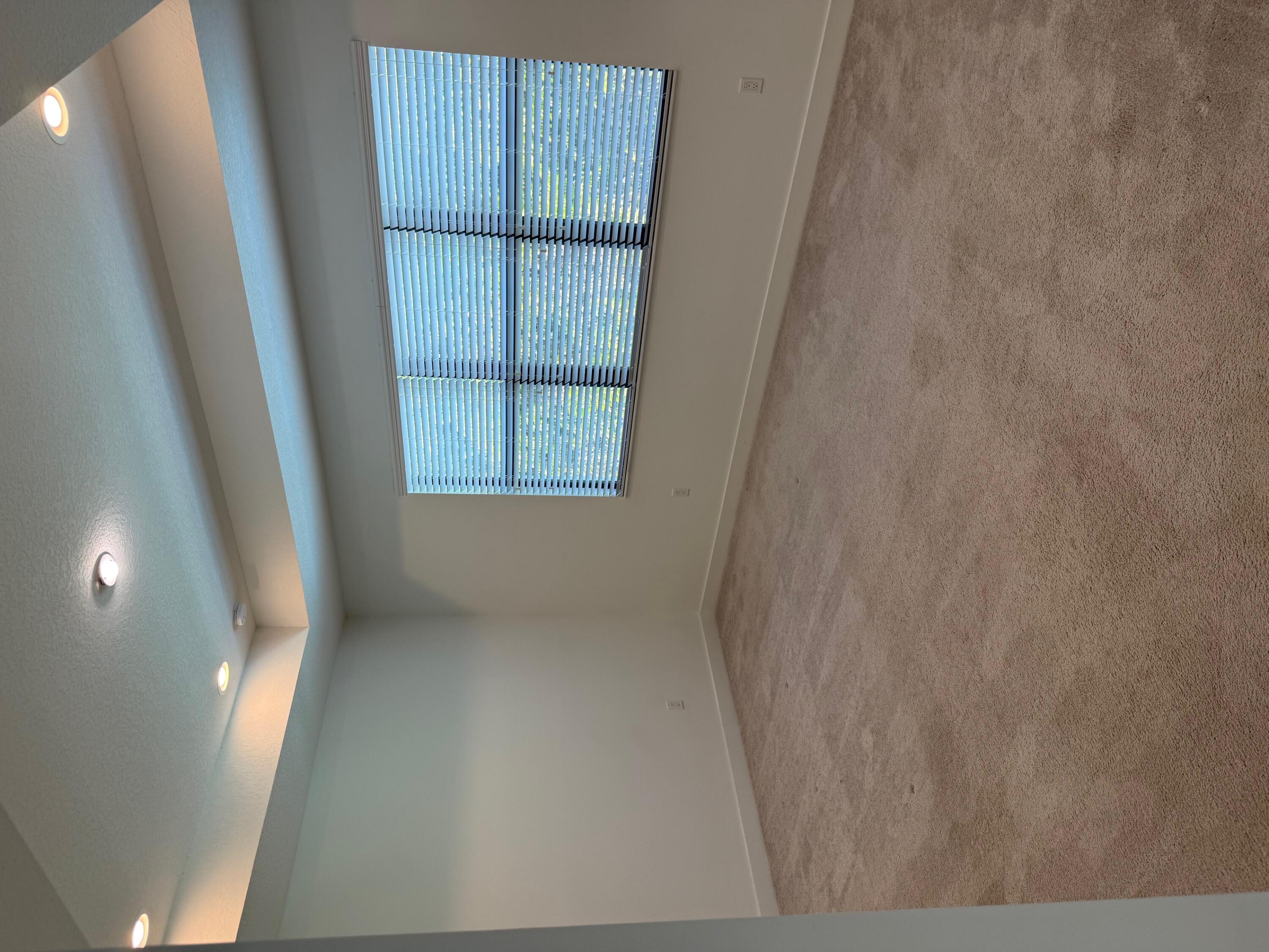 8055 White Wave Terrace Boca Raton, FL 33496 - Photo 12 of 20 a view of an empty room with a window
