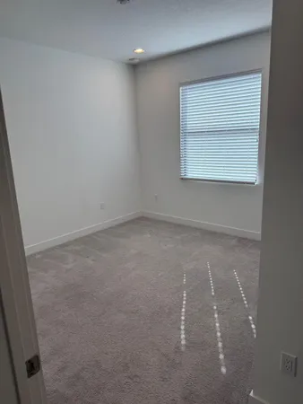 an empty room with a workbench