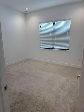 an empty room with a workbench