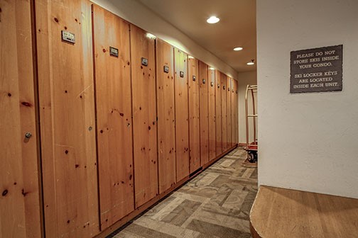22340 Highway 6, Unit 1785 Keystone, CO 80435 - Photo 17 of 28 a view of a hallway with wooden floor