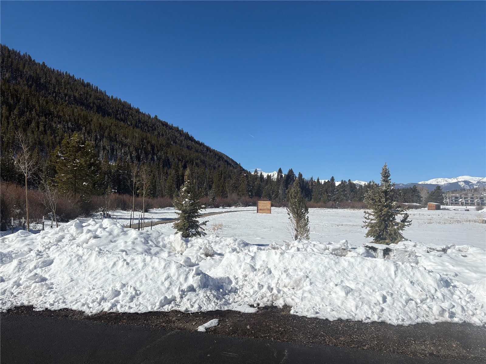 22340 Highway 6, Unit 1785 Keystone, CO 80435 - Photo 20 of 28 a view of a yard with snow