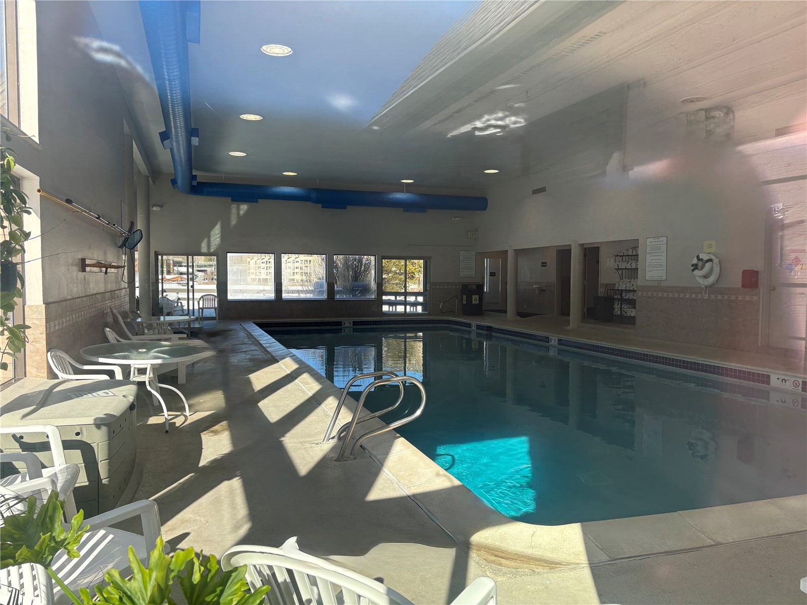 22340 Highway 6, Unit 1785 Keystone, CO 80435 - Photo 22 of 28 a kitchen with stainless steel appliances kitchen island granite countertop a refrigerator and a stove
