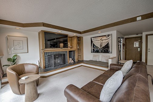 22340 Highway 6, Unit 1785 Keystone, CO 80435 - Photo 4 of 28 a living room with furniture and a fireplace