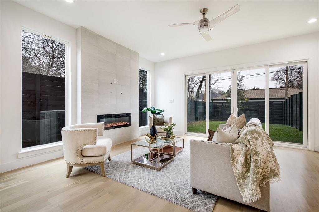 807 South Glasgow Drive Dallas, TX 75223 - Photo 3 of 39 a living room with furniture and a large window