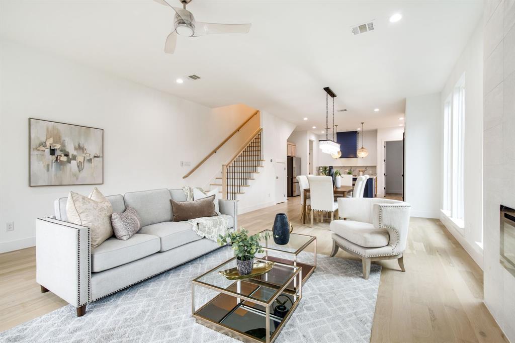 807 South Glasgow Drive Dallas, TX 75223 - Photo 4 of 39 a living room with furniture and wooden floor