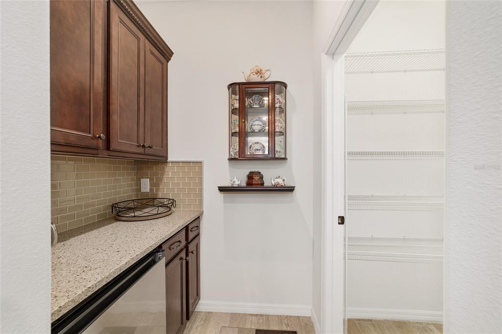 6479 Southwest 94th Circle Ocala, FL 34481 - Photo 27 of 82 a view of a kitchen with a sink