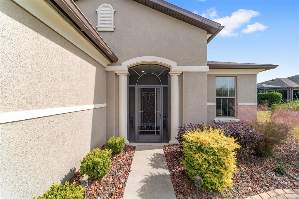 6479 Southwest 94th Circle Ocala, FL 34481 - Photo 3 of 82 a front view of a house