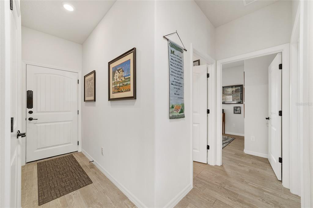 6479 Southwest 94th Circle Ocala, FL 34481 - Photo 43 of 82 a view of a hallway with wooden floor and closet area