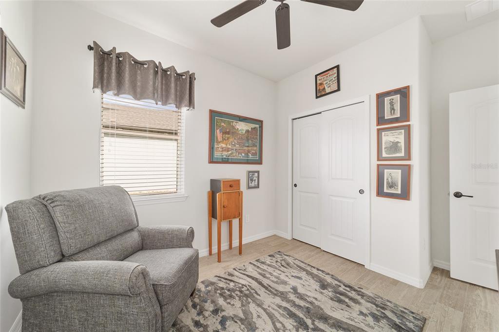 6479 Southwest 94th Circle Ocala, FL 34481 - Photo 48 of 82 a living room with furniture and a window