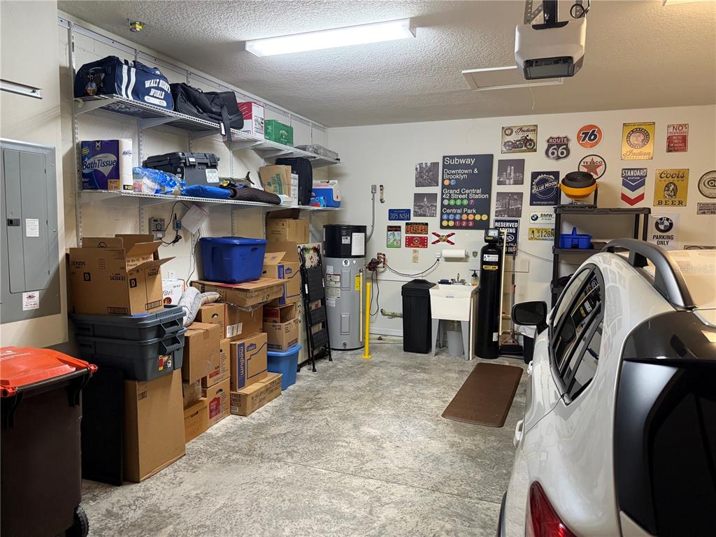 6479 Southwest 94th Circle Ocala, FL 34481 - Photo 52 of 82 a kitchen with a refrigerator and a stove top oven