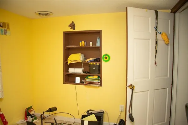 a bathroom with a sink and mirror