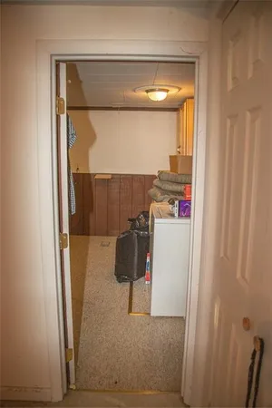 a bathroom with a shower and a sink