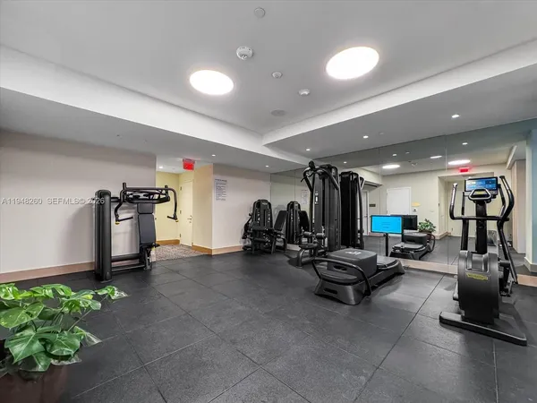 a view of a room with gym equipment