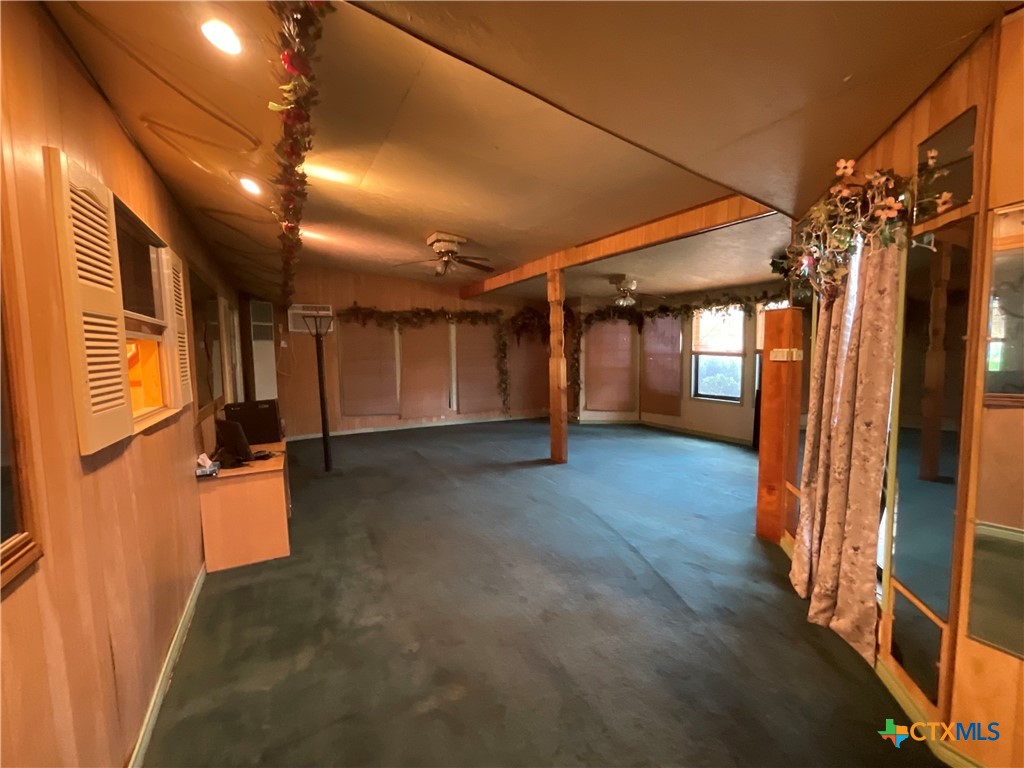 404 Svoboda Street Yoakum, TX 77995 - Photo 19 of 20 a view of empty room with wooden floor