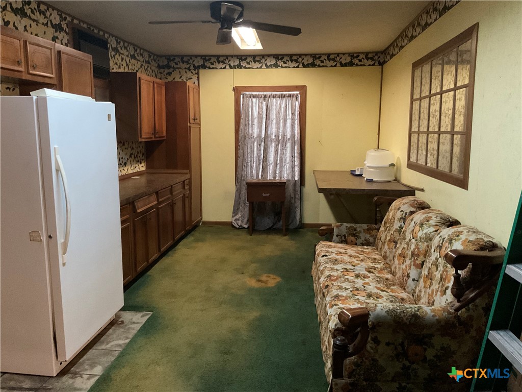 404 Svoboda Street Yoakum, TX 77995 - Photo 7 of 20 a living room with furniture and a window