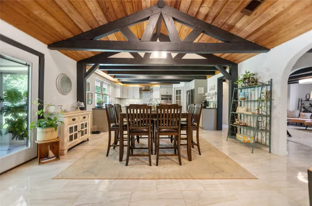 a view of a kitchen with furniture and a rug
