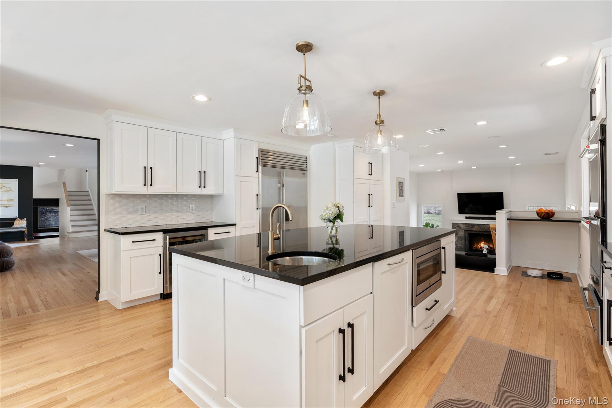 15 Haights Cross Road Chappaqua, NY 10514 - Photo 13 of 35 This Chef's kitchen with side by side Sub Zero, double ovens, boasts large center island