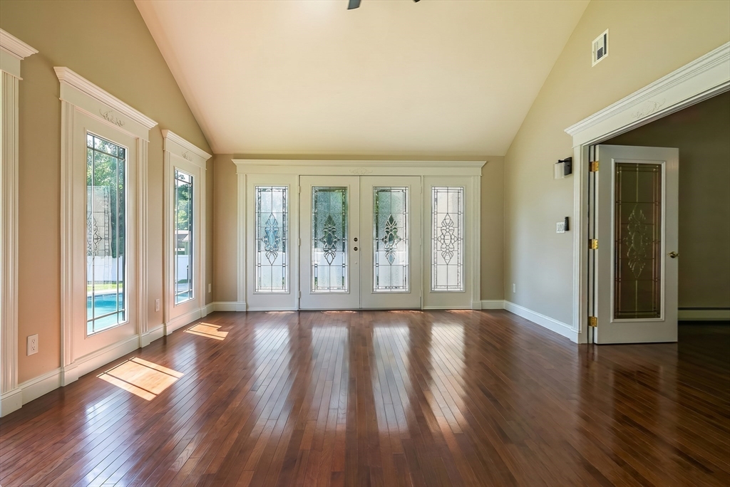 41 Watuppa Road Westport, MA 02790 - Photo 19 of 42 a view of an empty room with wooden floor and a window