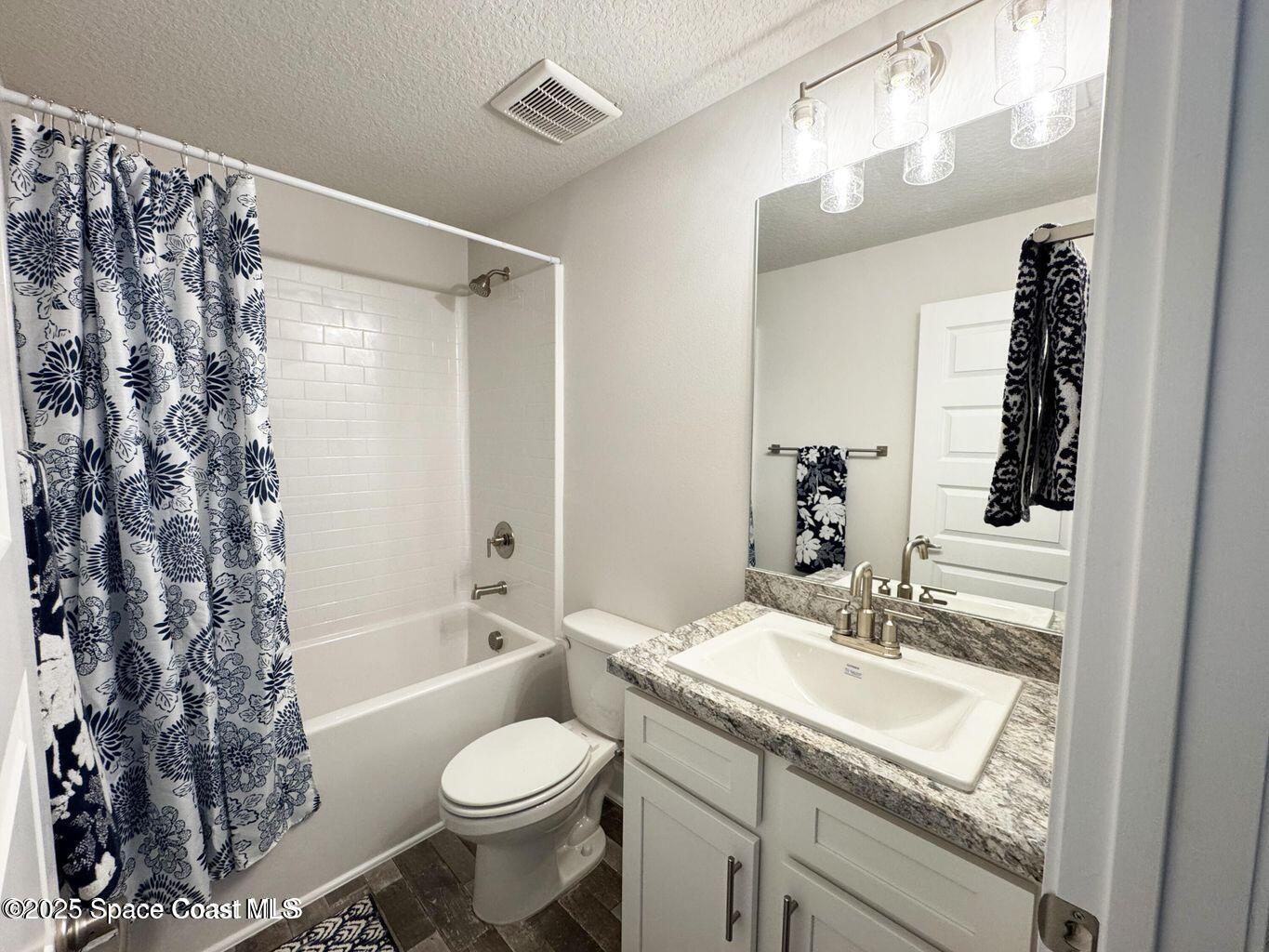 366 Faith Terrace Sebastian, FL 32958 - Photo 15 of 20 a bathroom with a sink toilet and shower