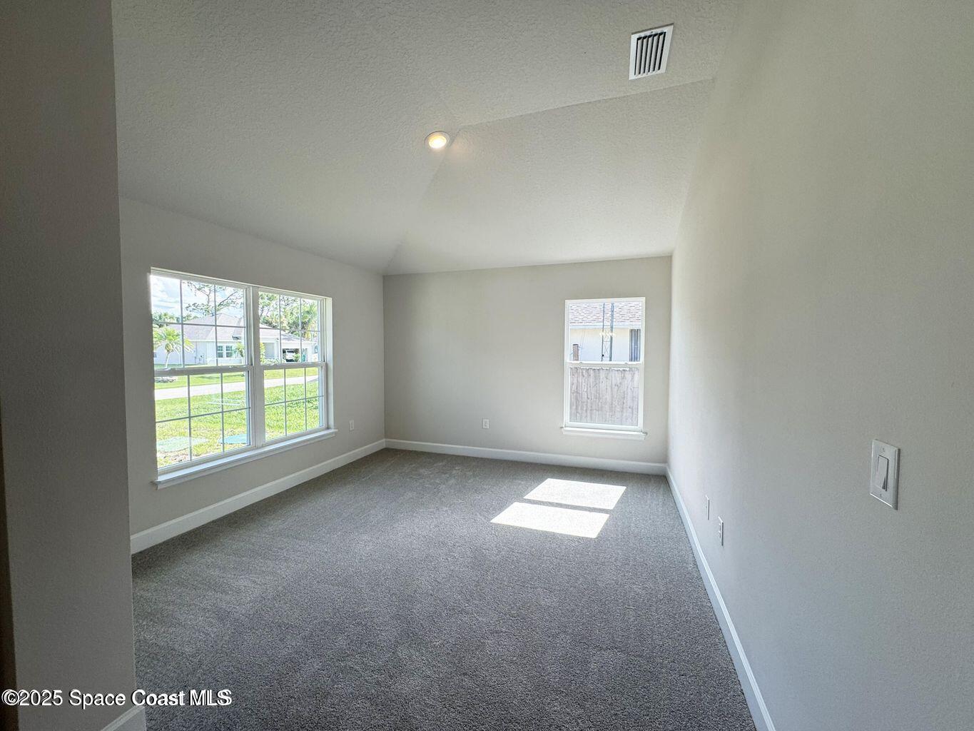 366 Faith Terrace Sebastian, FL 32958 - Photo 3 of 19 an empty room with windows