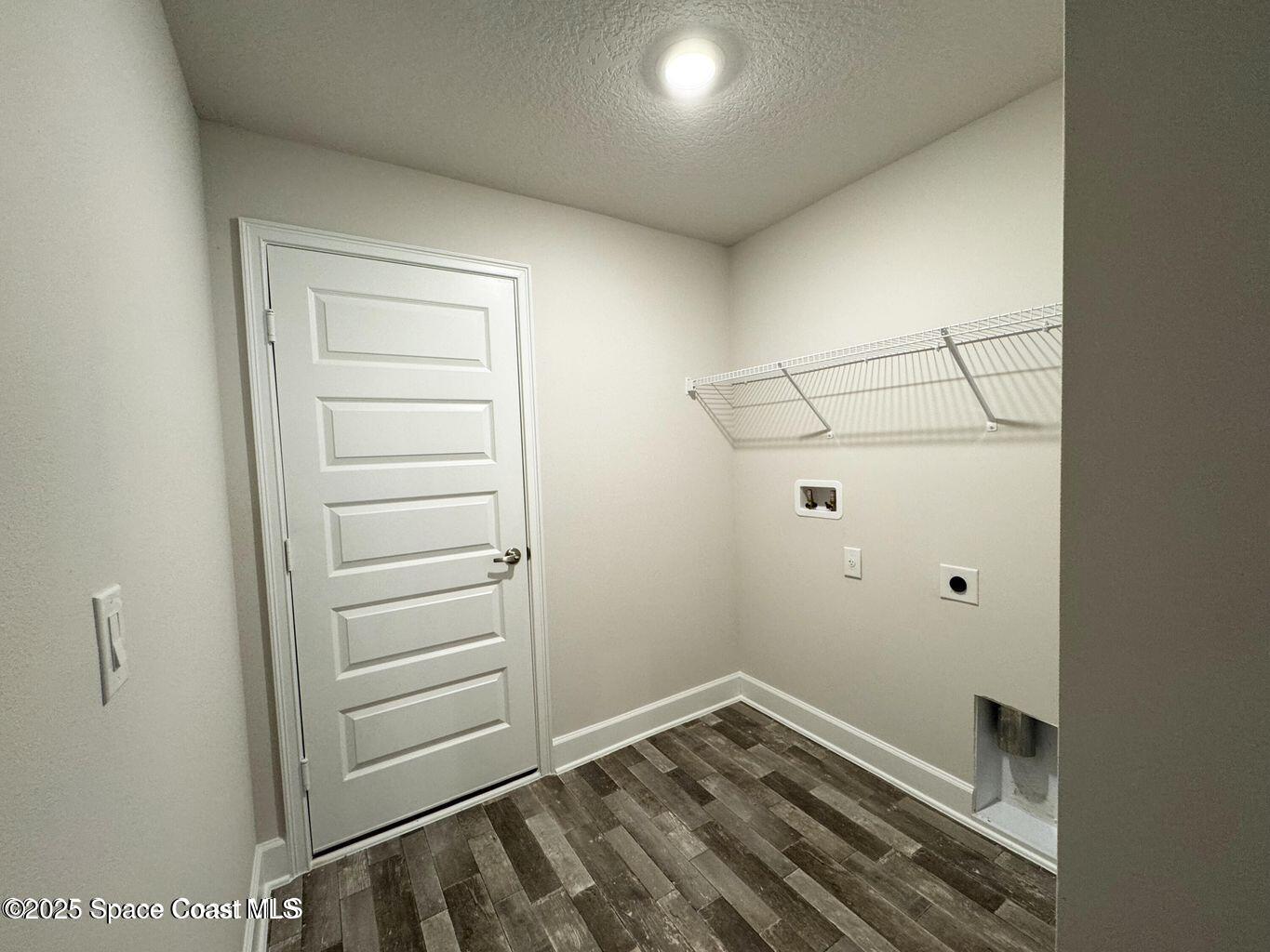 366 Faith Terrace Sebastian, FL 32958 - Photo 7 of 19 a view of walk in closet with empty racks