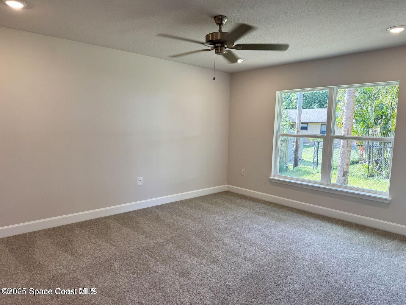 366 Faith Terrace Sebastian, FL 32958 - Photo 9 of 20 an empty room with a window