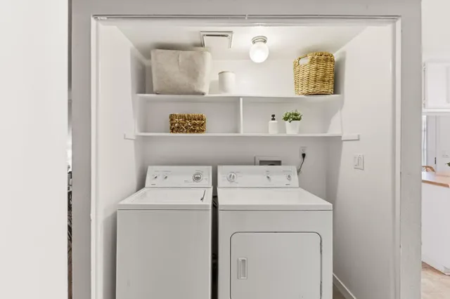 a utility room with dryer and washer