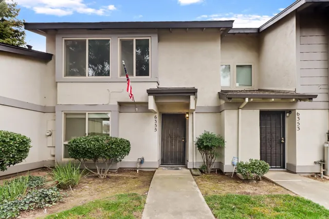 a house view with a outdoor space