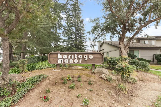 a view of a street with sign board
