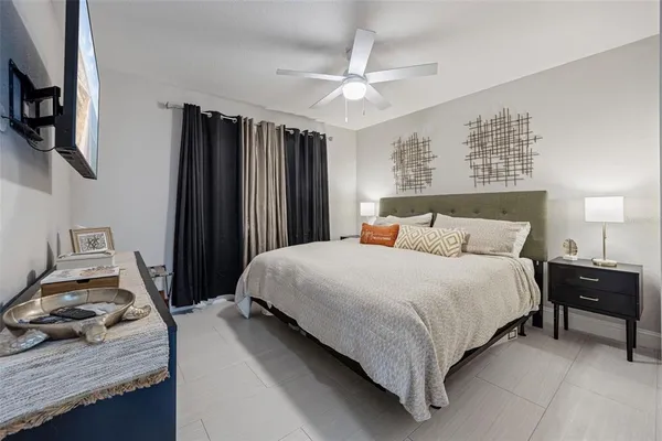 a bedroom with a bed and window