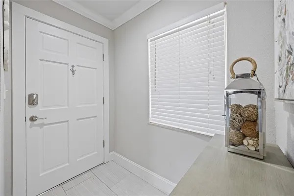 a view of a closet area with entryway